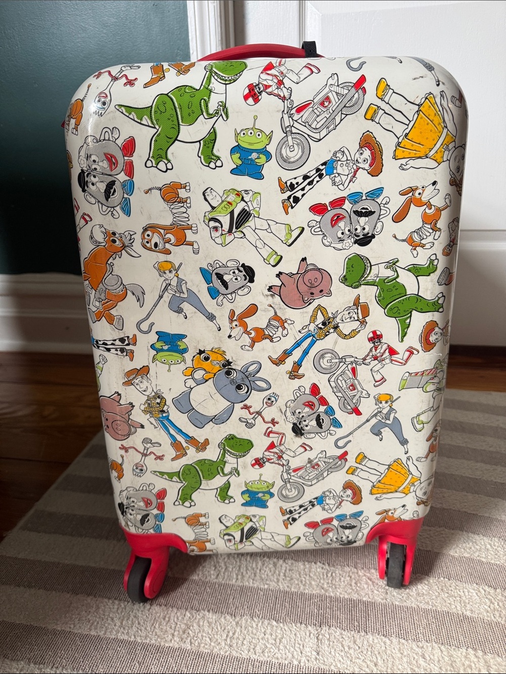 Disney Multicolor Toy Story Character Hardside Carry-On with Pink Wheels